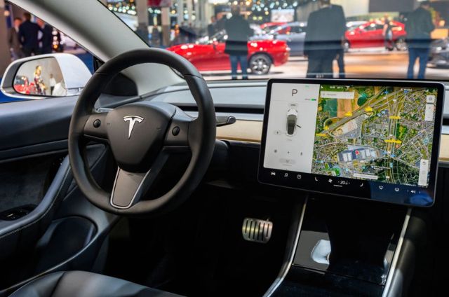 Tesla’s Next Move: EVs That Deliver Themselves
